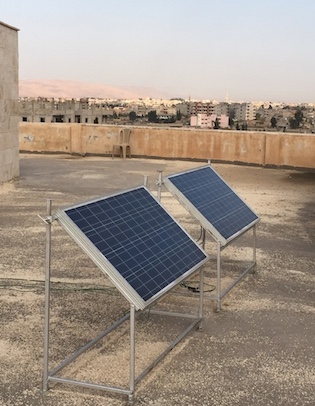 Solar panels atop the Mesopotamian Academy in Qamislo